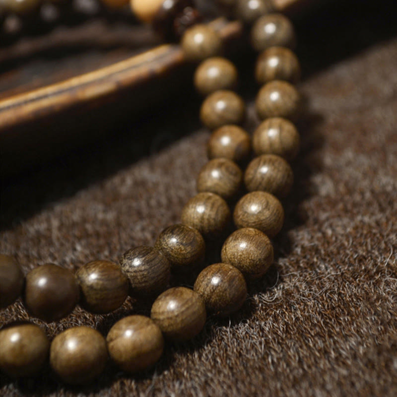 Bransoletka Mala z Buddha Stones z sandałowca tybetańskiego - image 12