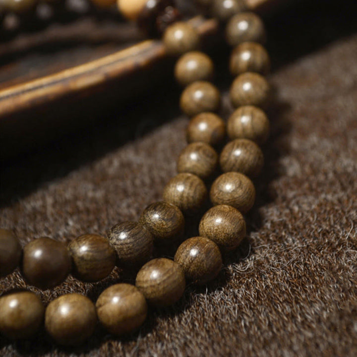 Bransoletka Mala z Buddha Stones z sandałowca tybetańskiego - image 12