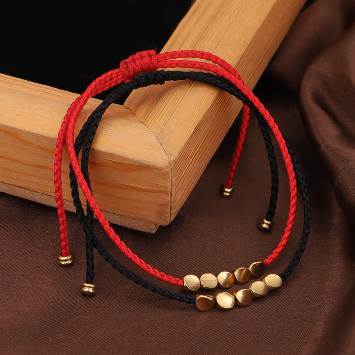 Bransoletka z czerwonego sznurka FengShui z Buddha Stones