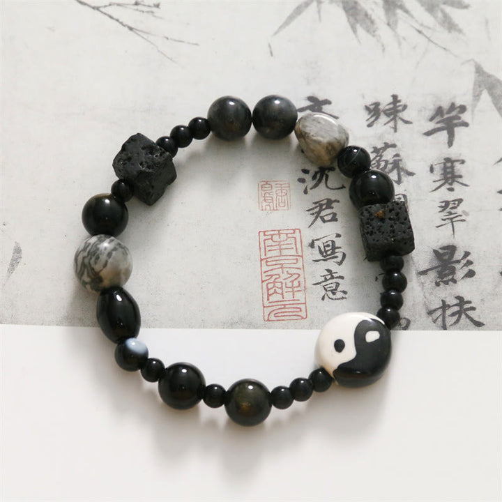 Bransoletka ochronna z Buddha Stones z czarnego onyksu i koralikami z jaspisu Picasso Yin Yang