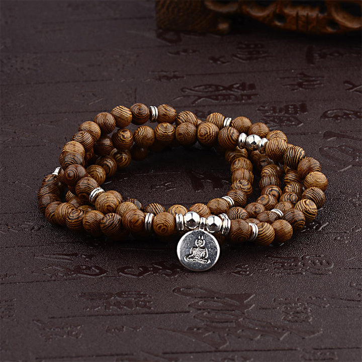 Bransoletka z drewna tybetańskiego z Buddha Stones, lotosem i malą Buddy - 2 - image 1