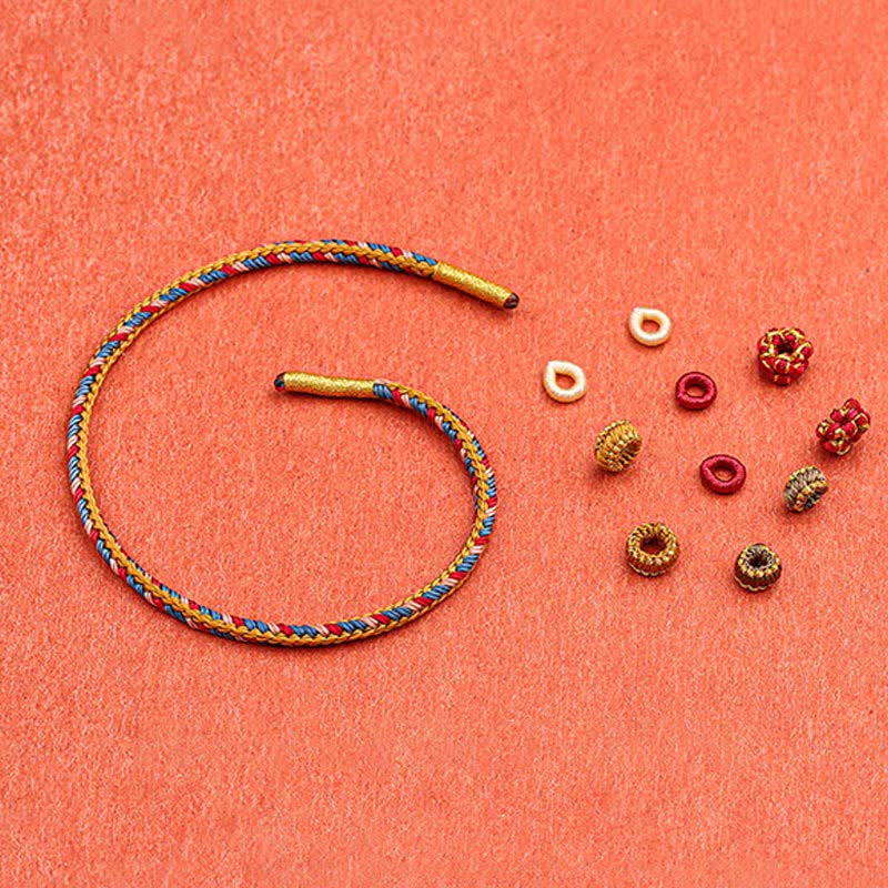 Bransoletka ze sznurka warkoczowego z Buddha Stones Dunhuang Color Luck