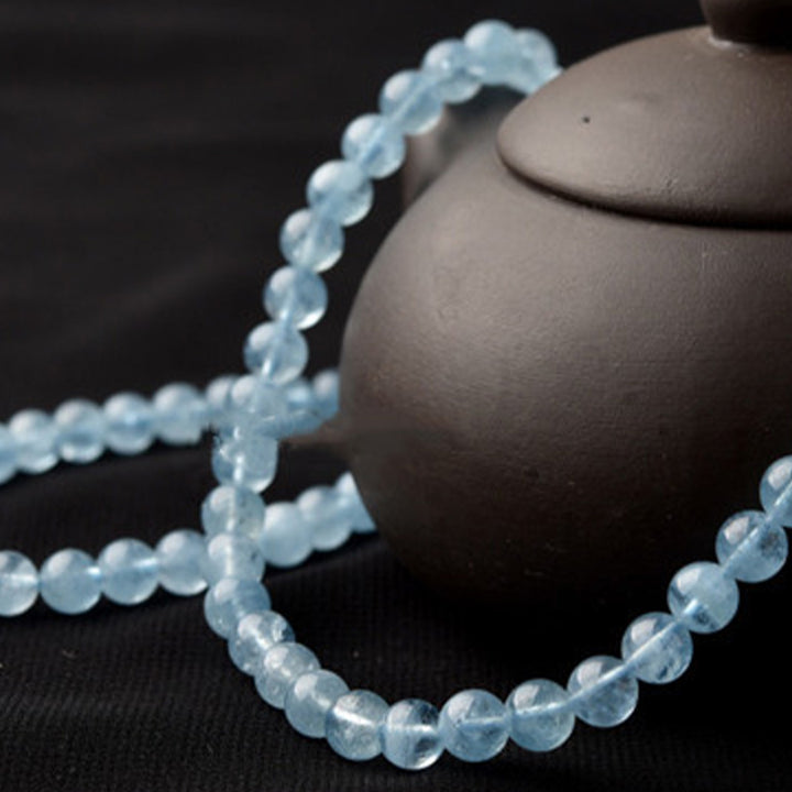 Bransoletka z Buddha Stones z naturalnego akwamarynu, która uzdrawia pokój