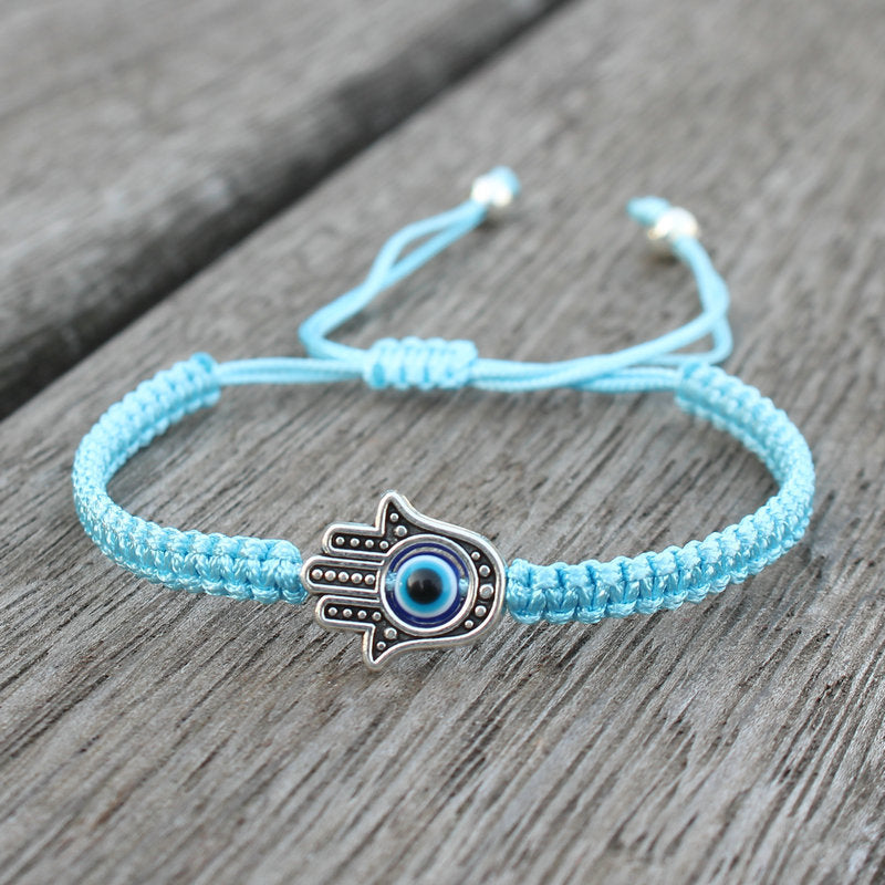 Bransoletka ze sznurka ochronnego z Buddha Stones , symbolem Hamsa, zapewniająca szczęście