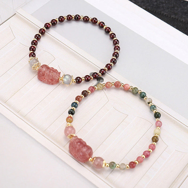 Bransoletka ochronna z Buddha Stones , naturalnym turmalinem, granatem i kwarcem truskawkowym PiXiu Moonstone