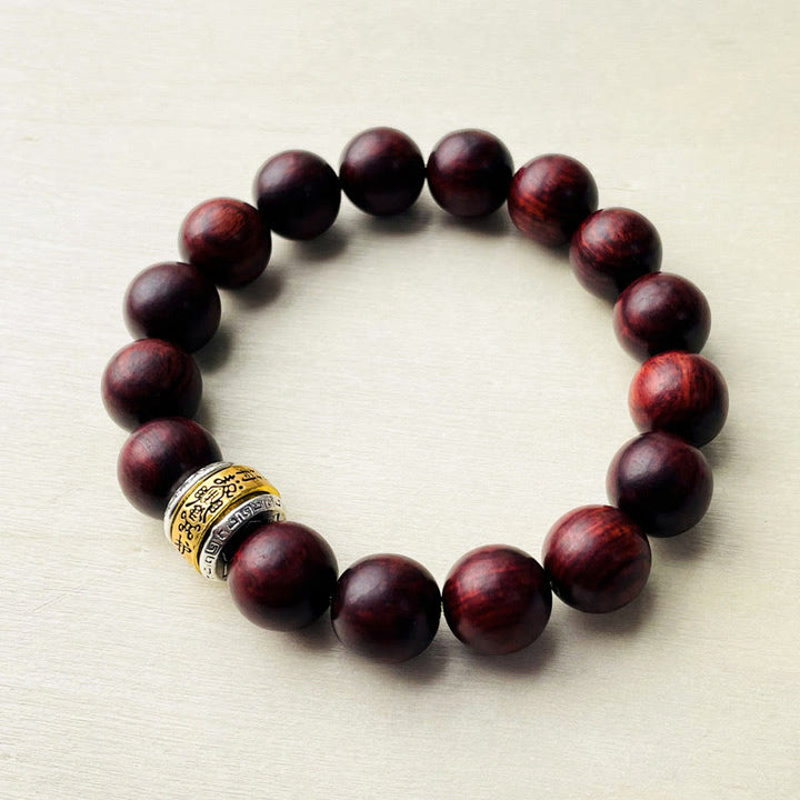 Bransoletka ochronna z amuletem z czerwonego drzewa sandałowego i Buddha Stones