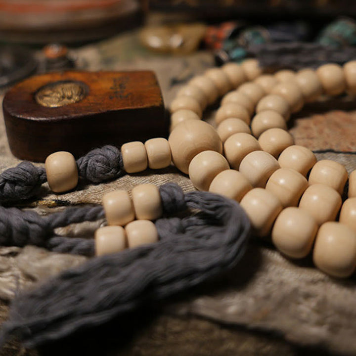 Buddha Stones 108 Mala Koraliki Abelia Biflora Drewno Odpędzające Złe Duchy Mala Nadgarstek