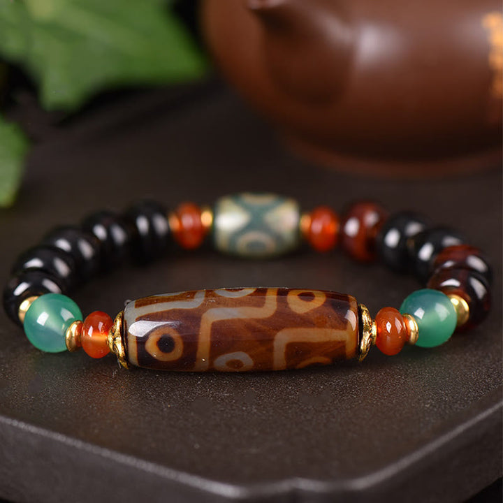 Buddha Stones Tybetańskie Naturalne Dziewięciooczne Koraliki Dzi Bransoletka Ochronna z Trójocznymi Koralikami Dzi