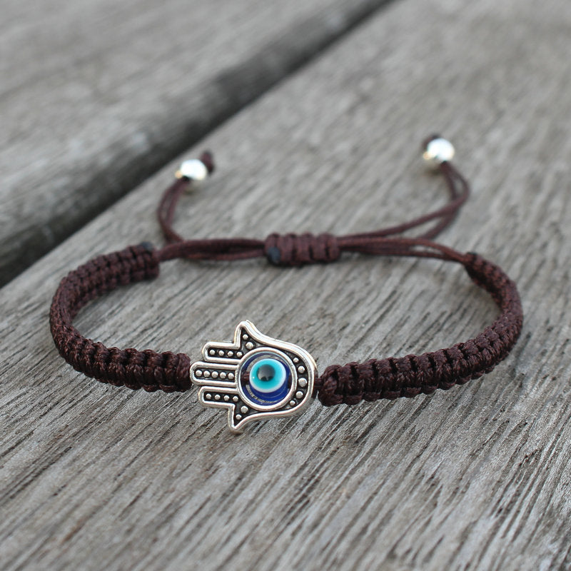 Bransoletka ze sznurka ochronnego z Buddha Stones , symbolem Hamsa, zapewniająca szczęście