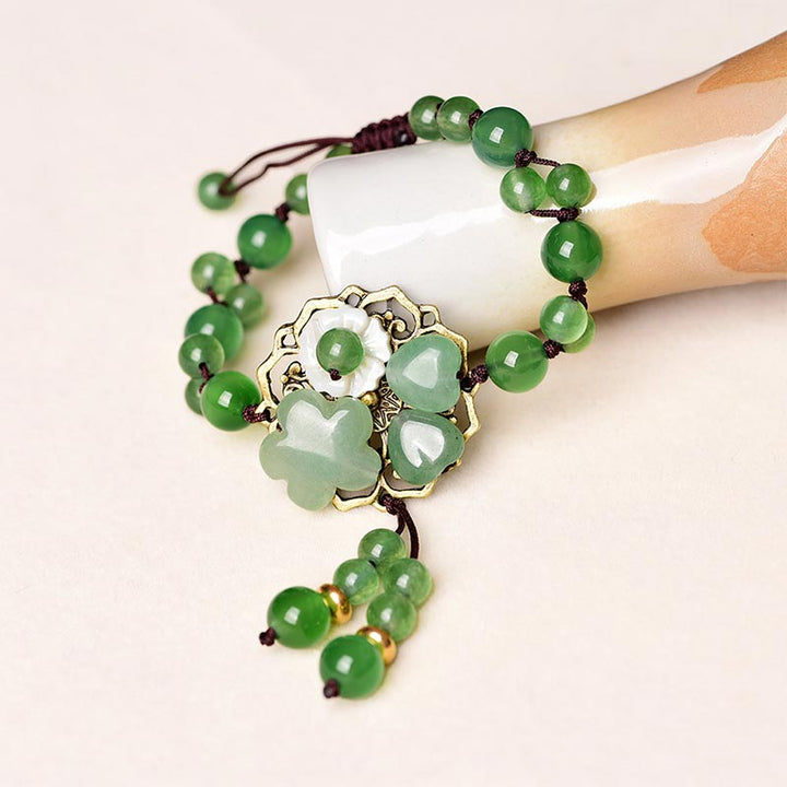 Bransoletka z naturalnego zielonego jadeitu z kwiatami szczęścia i Buddha Stones