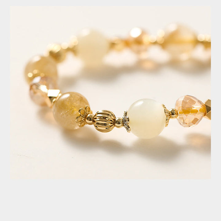 Bransoletka z Buddha Stones 14K pozłacana złotym rutylowym kwarcem Wealth Bell Lucky Fortune Charm