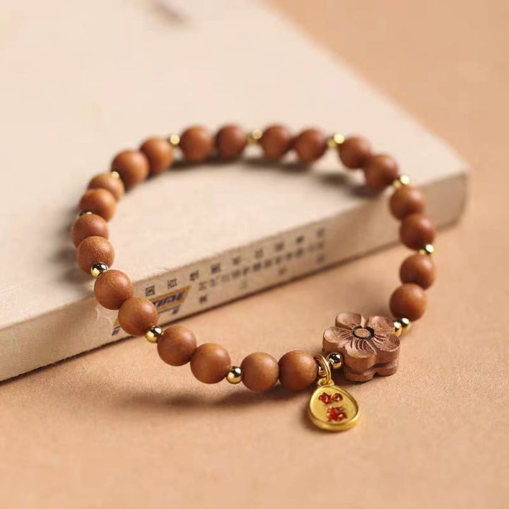 Buddha Stones Naturalne Drzewo Sandałowe Brzoskwiniowy Kwiat Mały Liść Czerwonego Drzewa Sandałowego Ruyi Charm Bransoletka Ochronna