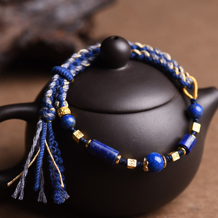Bransoletka z naturalnych koralików Lazurite z Buddha Stones wykonana ręcznie z pozytywnej liny