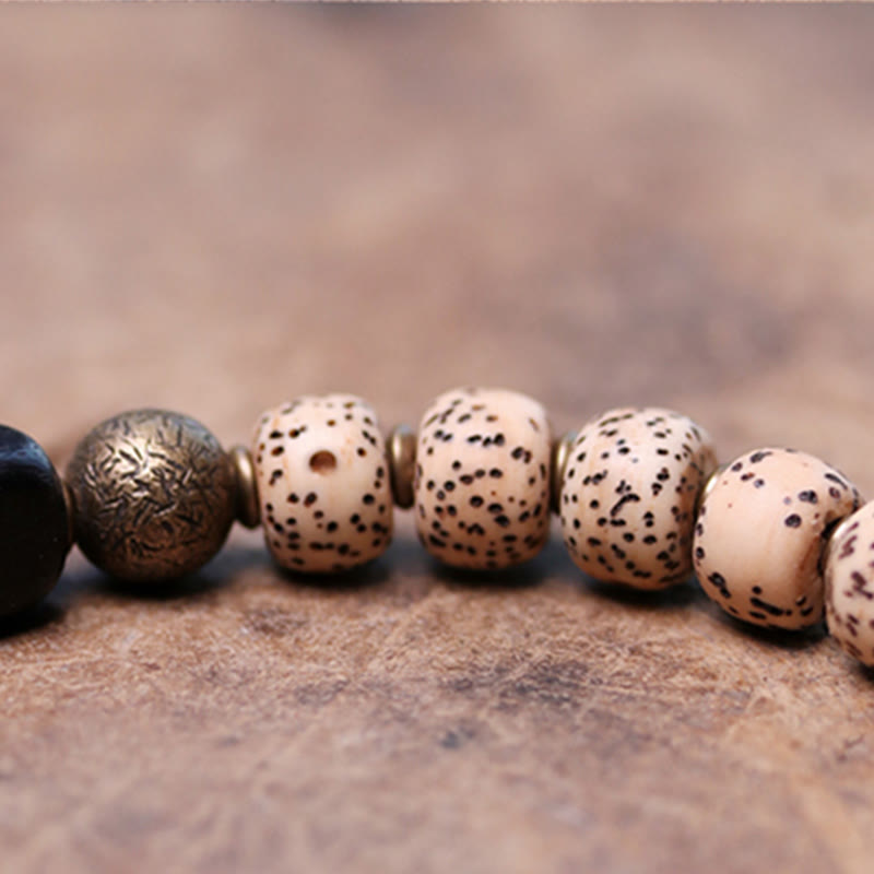 Buddha Stones Tybetańskie Nasiona Bodhi Czarny Obsydian Drewno Hebanowe Miedź Bransoletka Spokoju