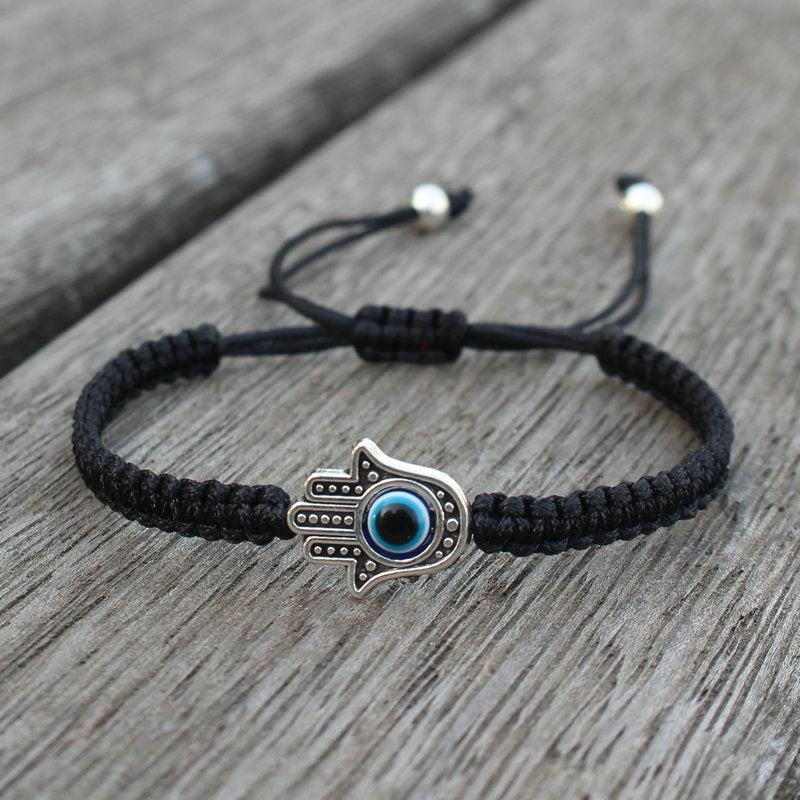 Bransoletka ze sznurka ochronnego z Buddha Stones , symbolem Hamsa, zapewniająca szczęście