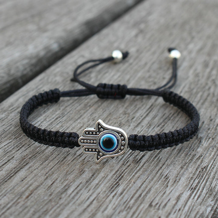Bransoletka ze sznurka ochronnego z Buddha Stones , symbolem Hamsa, zapewniająca szczęście