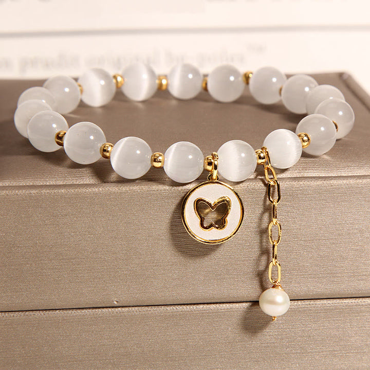 Bransoletka Buddha Stones Cat's Eye Butterfly Charm Love