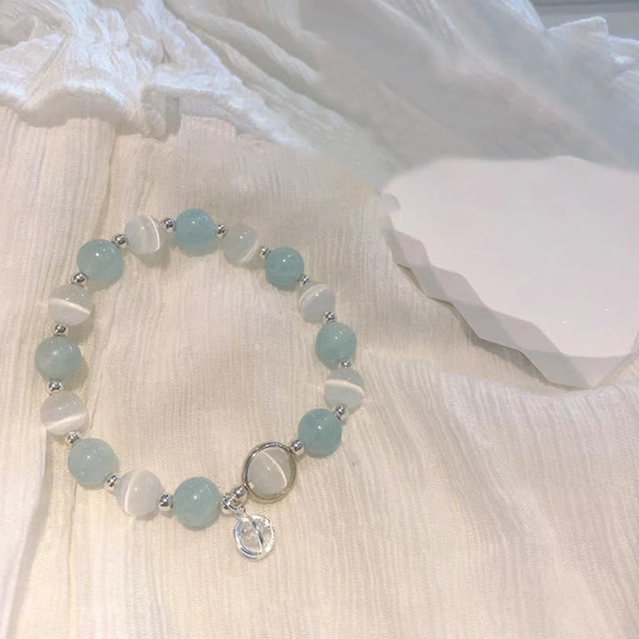 Bransoletka z zawieszkami Buddha Stones 925 ze srebra próby 925 z motywem kociego oka i akwamarynu