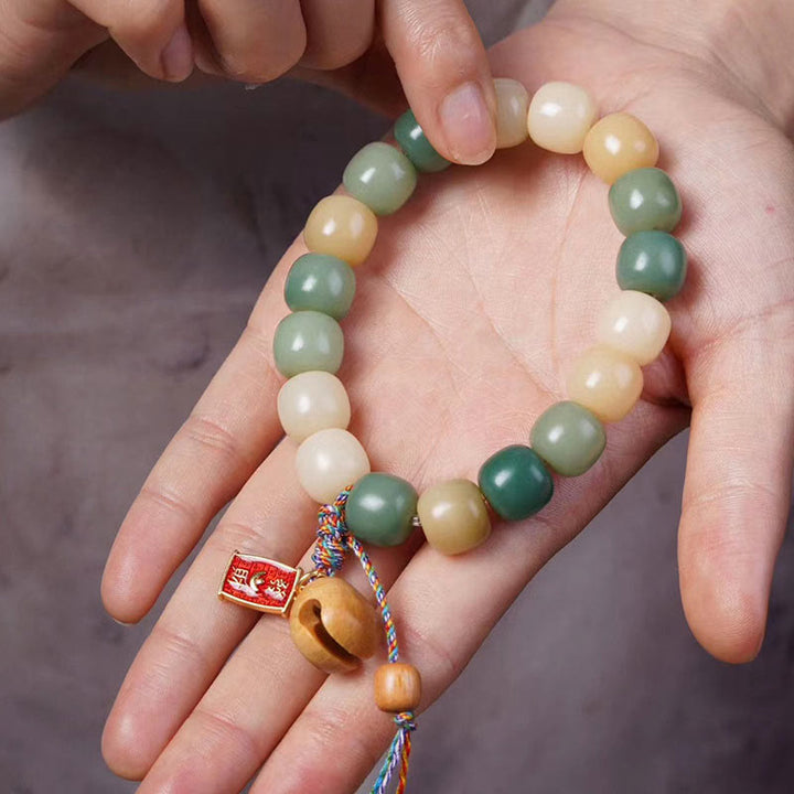 Buddha Stones Naturalny Gradient Bodhi Nasiona Mądrości Drewniana Bransoletka z Bębnem Rybnym