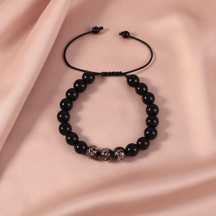 Bransoletka Buddha Stones Black Obsidian Luminous Glowstone Strength