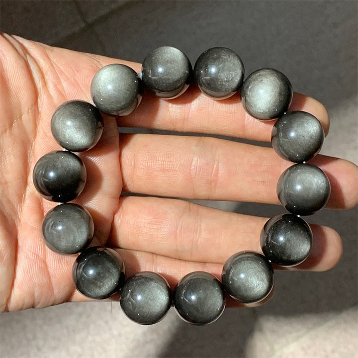 Bransoletka ochronna z naturalnego obsydianu i Buddha Stones w kolorze srebra