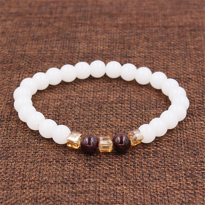 Bransoletka ochronna z naturalnego białego jadeitu z Buddha Stones