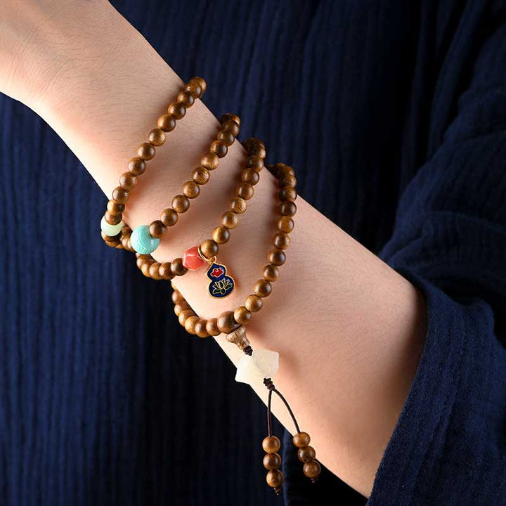 Bransoletka ochronna z palisandru tybetańskiego z Buddha Stones Mala