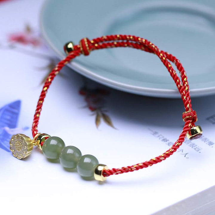Bransoletka z naturalnego jadeitu i nasion lotosu z czerwonej nici Buddha Stones