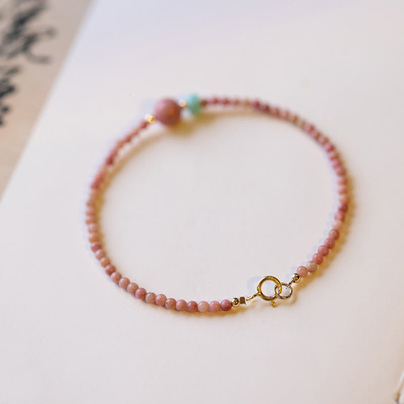 Bransoletka z naturalnego rodonitu i łańcuszka energetycznego z Buddha Stones 14K pozłacana