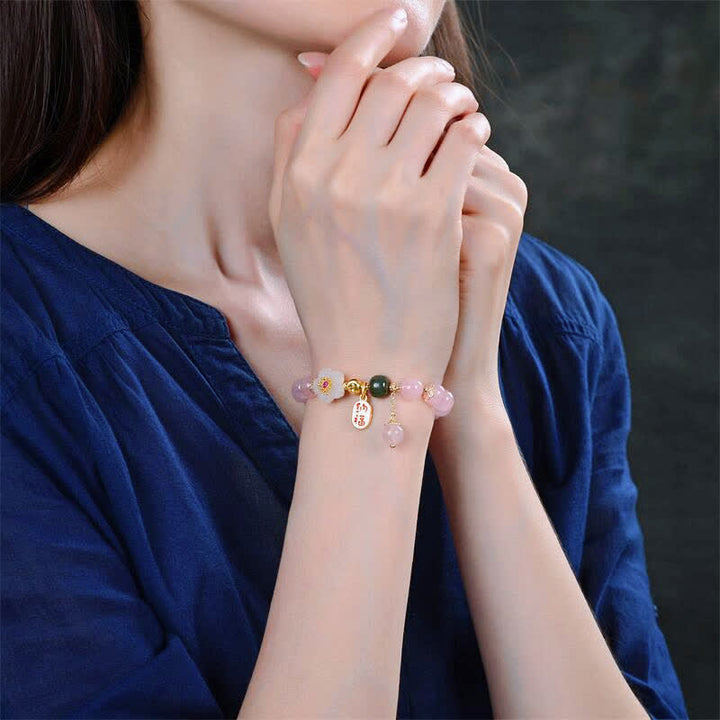 Bransoletka z naturalnego różowego kryształu jadeitu i kwiatów Buddha Stones z ciepłą miłością