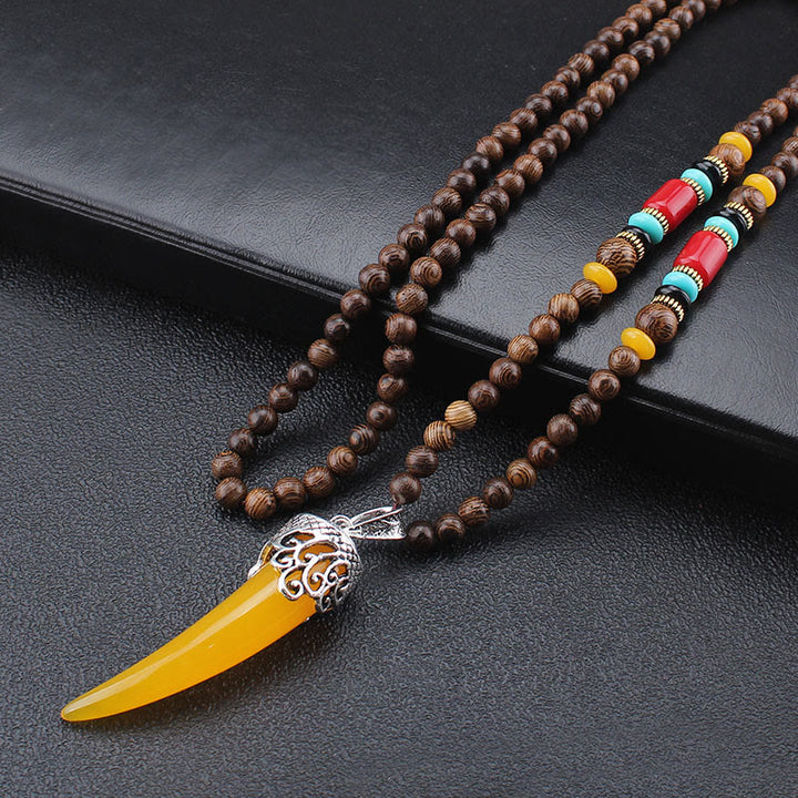 Wisiorek z kamienia wenge wood turquoise horn protection meditation style