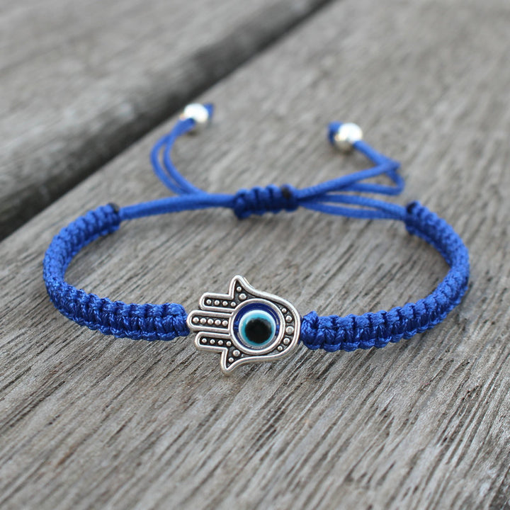 Bransoletka ze sznurka ochronnego z Buddha Stones , symbolem Hamsa, zapewniająca szczęście
