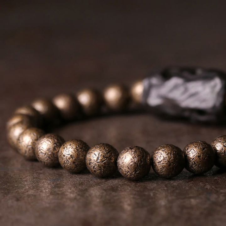 Buddha Stones Tybet Heban Drewno Miedź Pokój Równowaga Bransoletka Koralikowa
