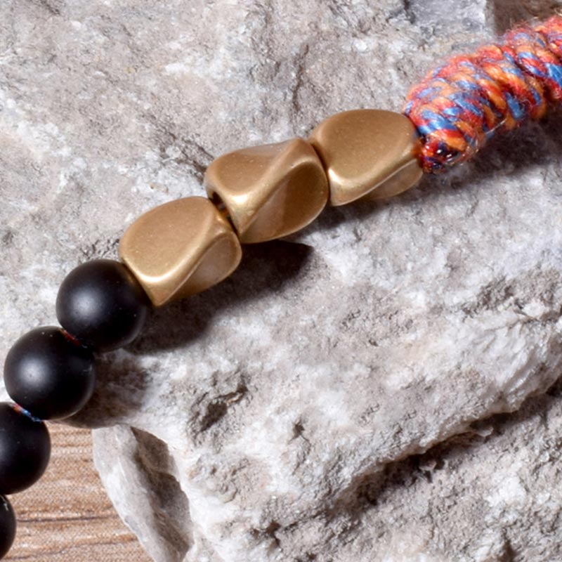Bransoletka z frędzlami z Buddha Stones wykonana ręcznie z tybetańskiego czarnego onyksu