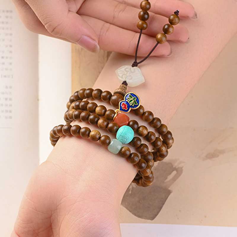 Bransoletka ochronna z palisandru tybetańskiego z Buddha Stones Mala