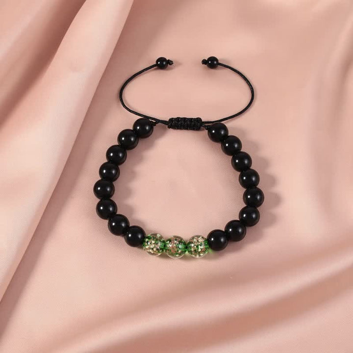 Bransoletka Buddha Stones Black Obsidian Luminous Glowstone Strength