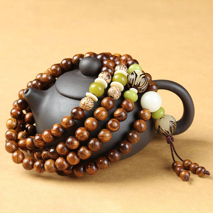 Bransoletka ochronna Mala z palisandru tybetańskiego z Buddha Stones