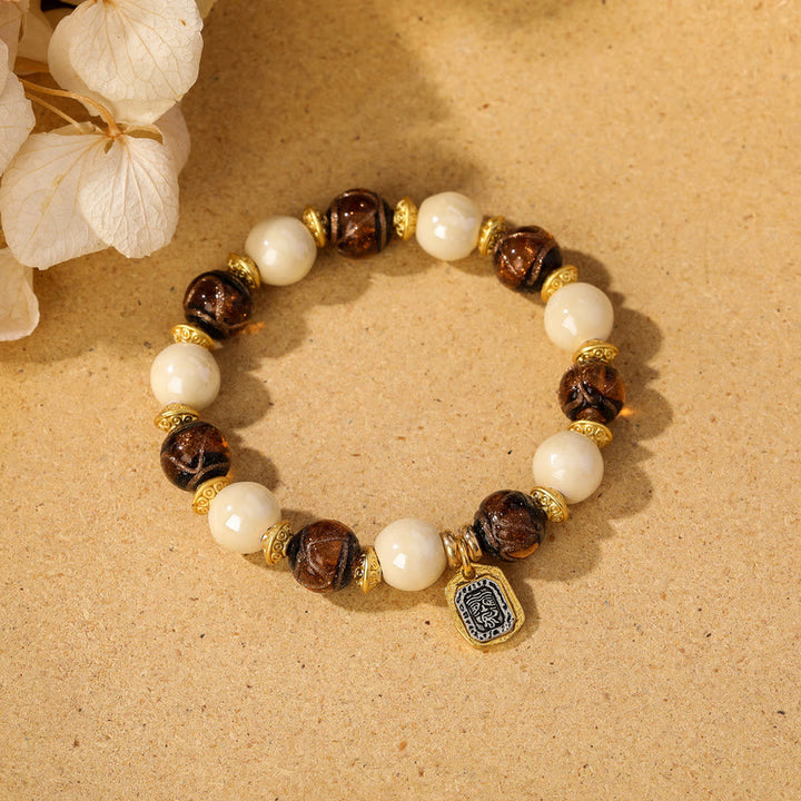 Buddha Stones Tybetański Zakiram Bogini Bogactwa Charm Liuli Szkło Kadzidło Popiół Porcelanowy Koralik Ochrona Bransoletka