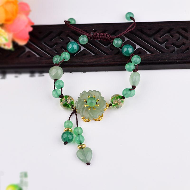 Bransoletka z naturalnego zielonego jadeitu z kwiatami szczęścia i Buddha Stones