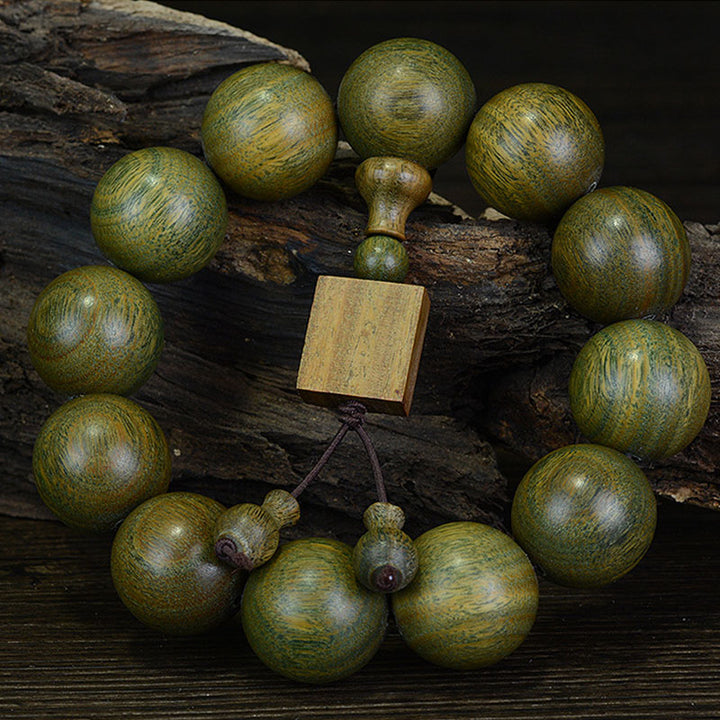 Bransoletka lecznicza z zielonego drzewa sandałowego Buddha Stones - 20 mm (12 koralików) - image 0