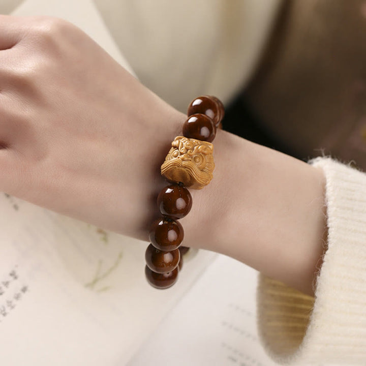 Bransoletka z Buddha Stones Fioletowe Nasiona Bodhi Tańczący Lew Mądrość