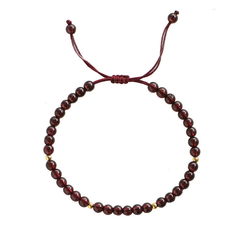 Bransoletka stabilizacyjna z Buddha Stones, naturalnymi granatami i złotymi koralikami