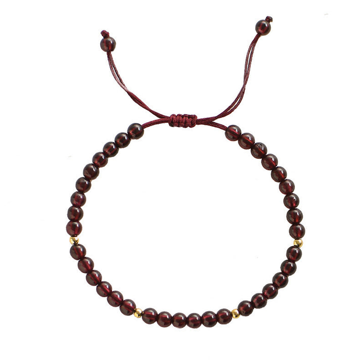 Bransoletka stabilizacyjna z Buddha Stones, naturalnymi granatami i złotymi koralikami