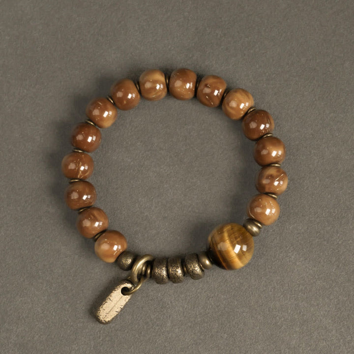 Bransoletka z Buddha Stones , nasiona Kuka, tygrysie oko, złoty połysk obsydianu, mosiądzu i miedzi, zapewniająca bogactwo i szczęście - image 1