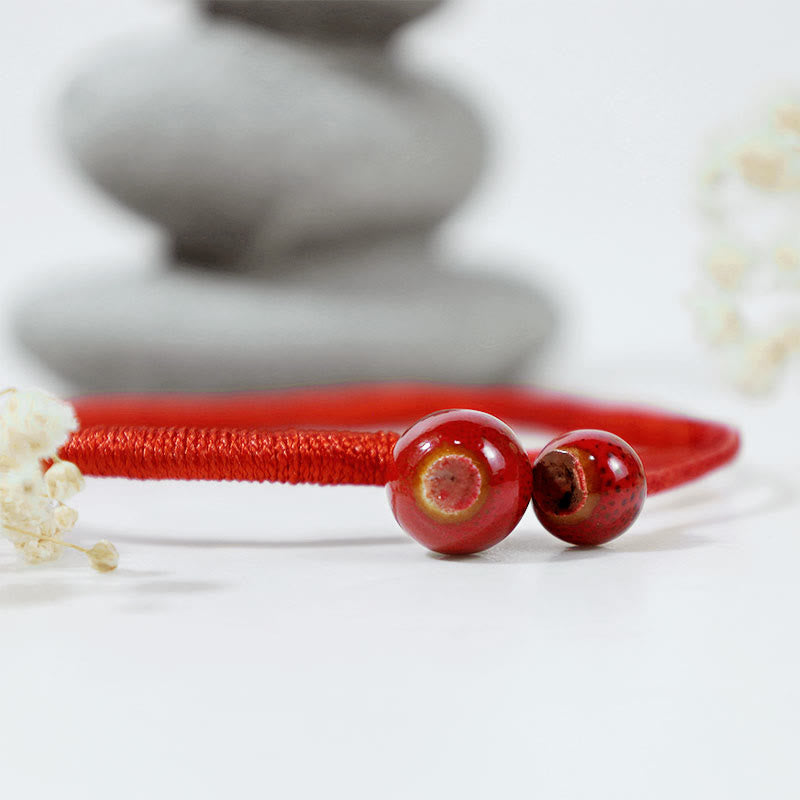 Bransoletka ceramiczna z czerwonymi sznurkami i Buddha Stones FengShui - image 3