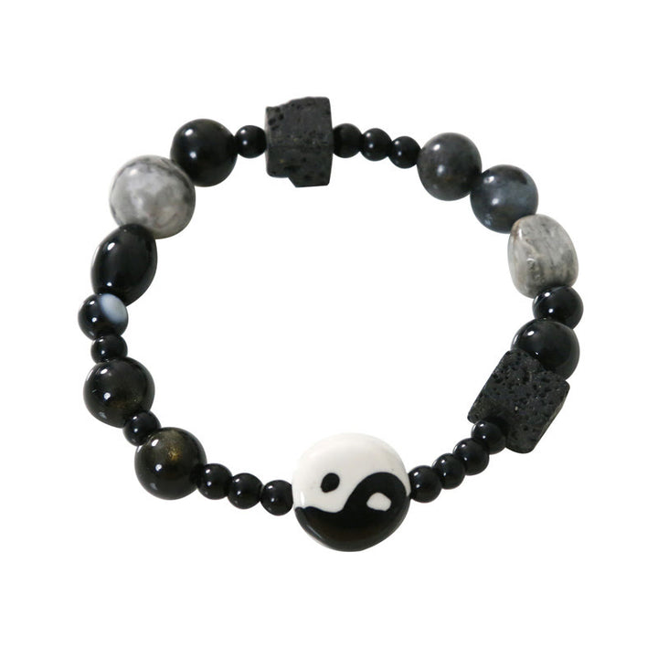 Bransoletka ochronna z Buddha Stones z czarnego onyksu i koralikami z jaspisu Picasso Yin Yang
