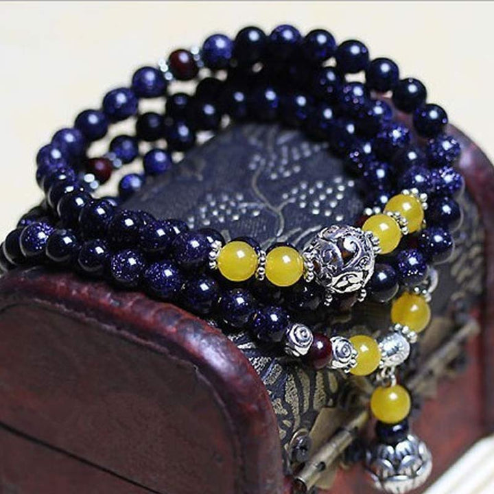 Bransoletka z zawieszkami bogactwa z niebieskiego piaskowca i Buddha Stones Mala