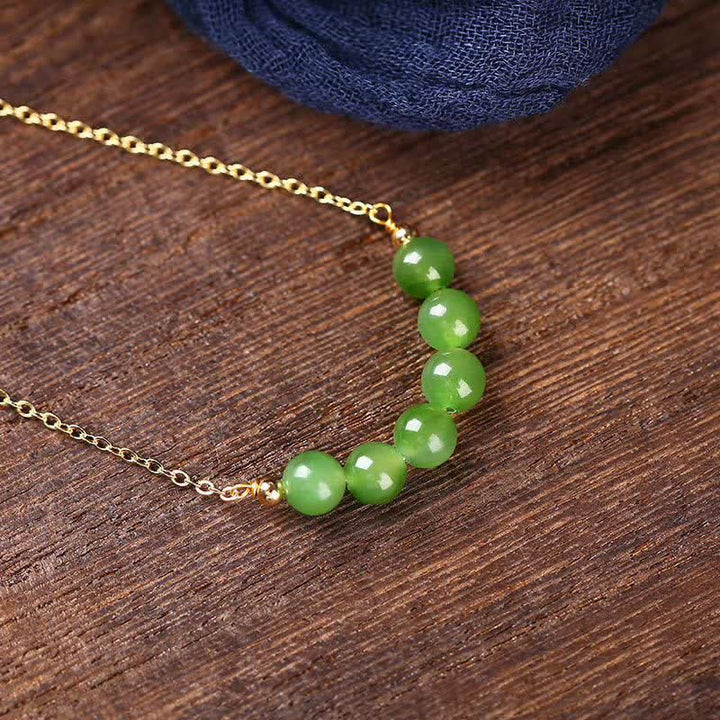 Naszyjnik z koralików Hetian Cyan Jade wykonany ze złota 14k