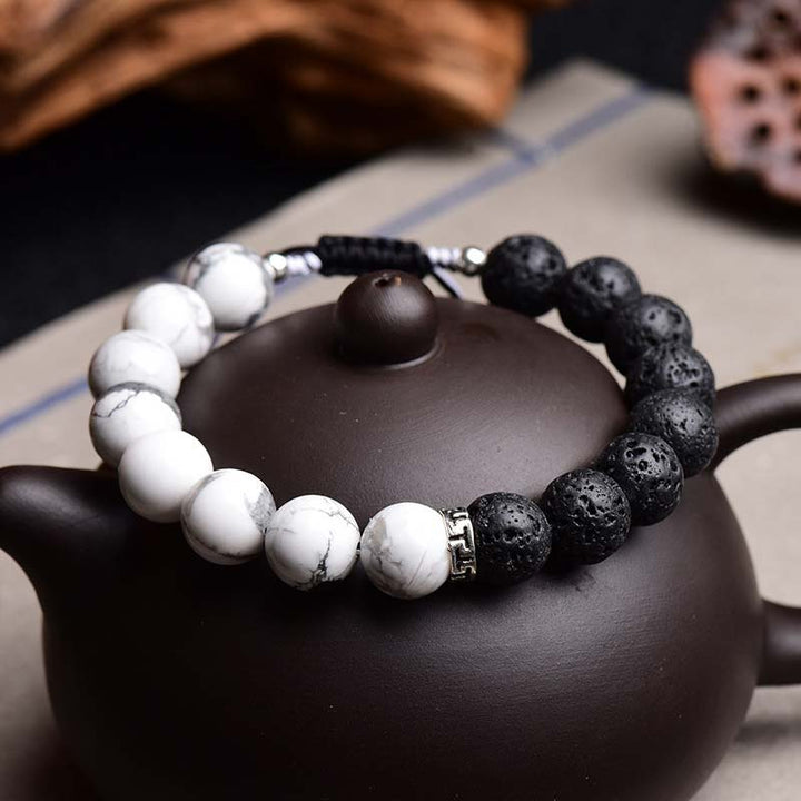 Bransoletka ochronna z kamieniami lawowymi Yin Yang Buddha Stones