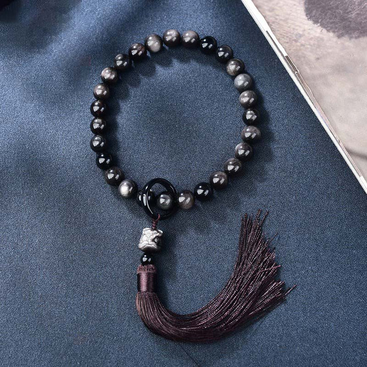 Buddha Stones Naturalny Srebrny Połysk Obsydian Lew Mala Ochrona Nadgarstka Frędzle Kieszonkowa Mala Dekoracja Samochodu